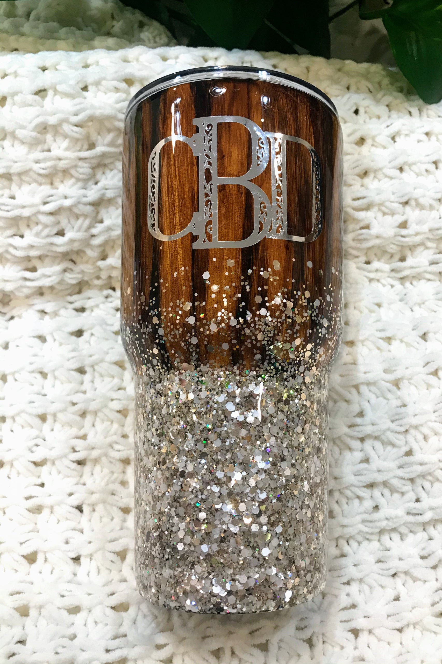 This listing is for a beautiful, black holographic glitter tumbler